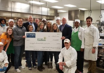 Delphi Wealth Management Presents $25,000 Donation to Food Bank